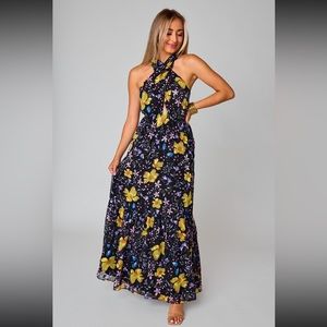 Criss cross front maxi dress in back floral chiffon. Size large. Worn once